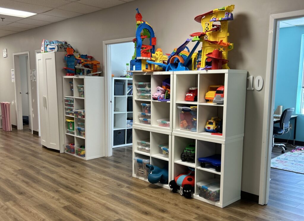 Playroom view of doorways to room 7, 9 and 10